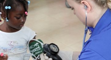 Student Treating Patient in the Dominican Republic