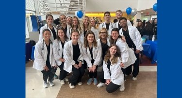 Physician Assistant students and faculty stand together for a group photo at the Bronx Campus